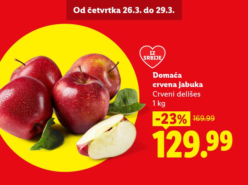 Crvene jabuke na žutoj pozadini sa cenom od 129.99 dinara, snižene za 23%.