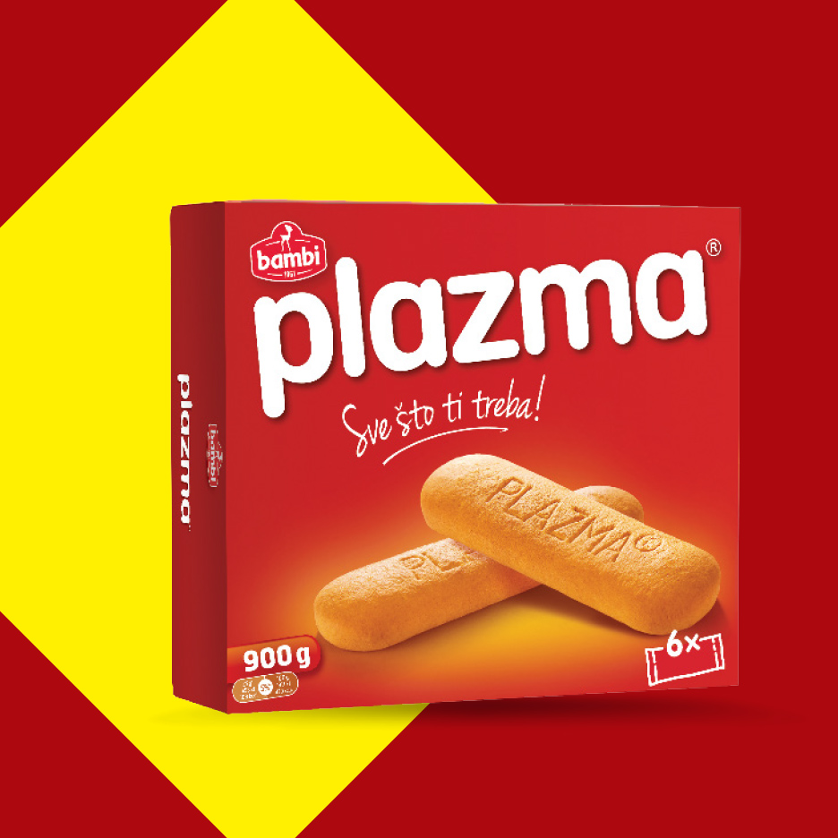 Kutija keksa sa natpisom „Sve što ti treba!“ i dva keksa ispred nje.